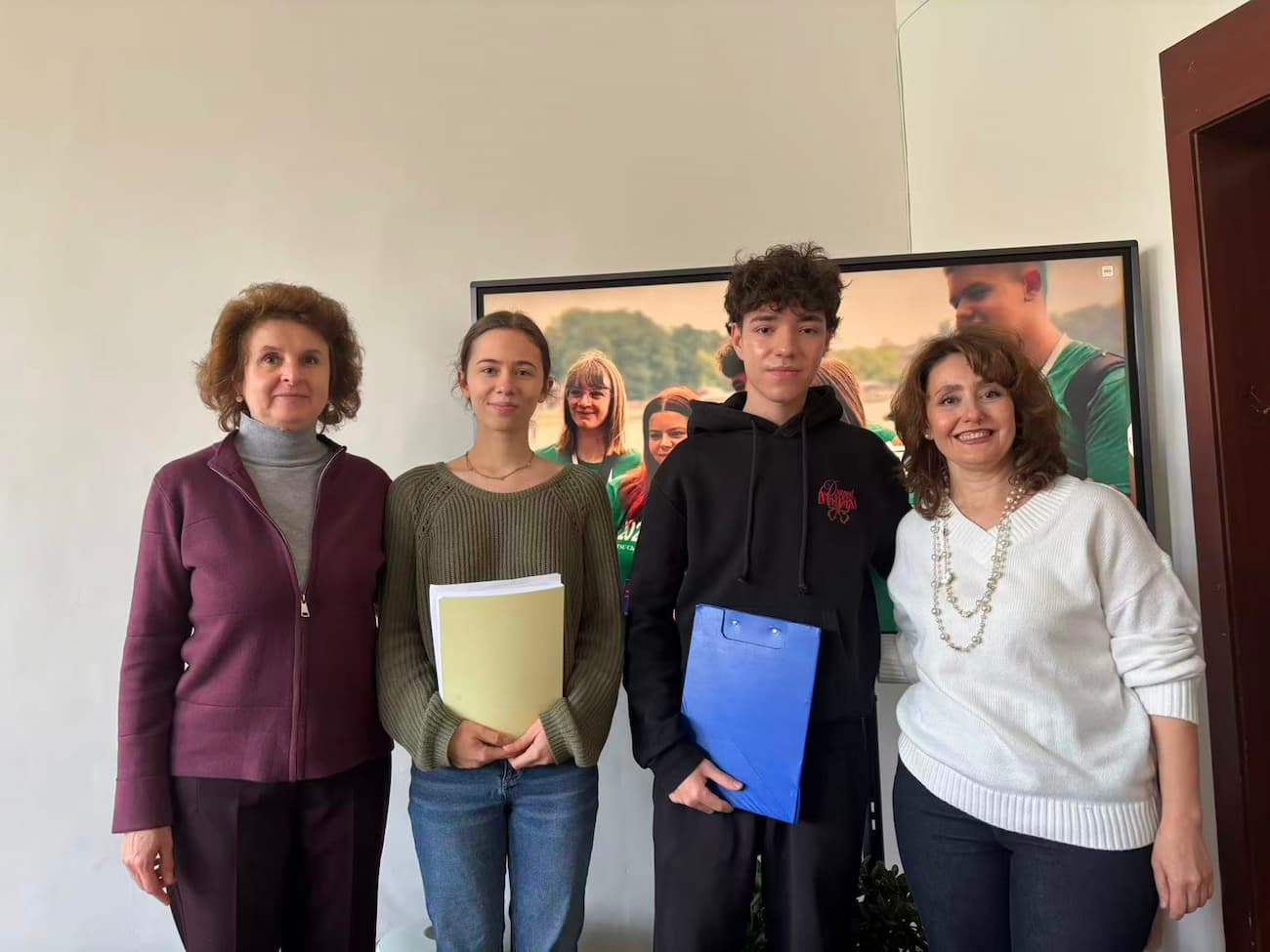 Photo 3: The school’s principal and vice principal with the two invited student speakers