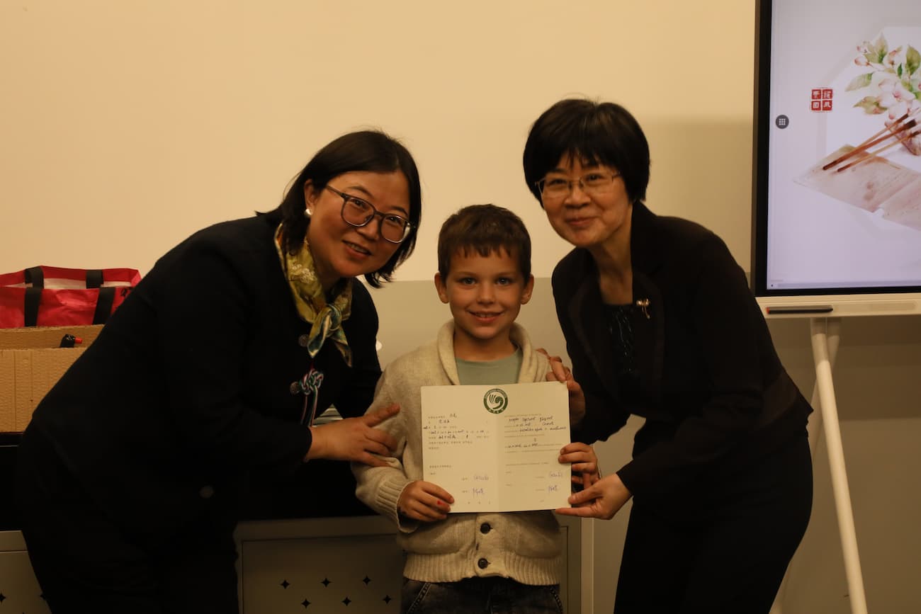 Photo 3: Students received their completion certificates