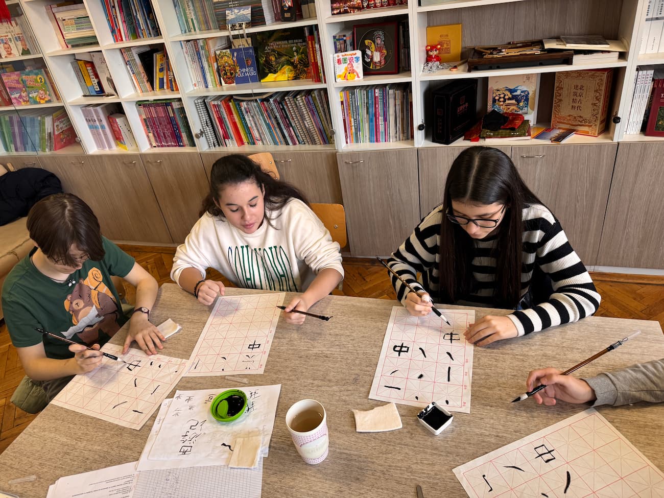 Photo 2: Students practiced calligraphy