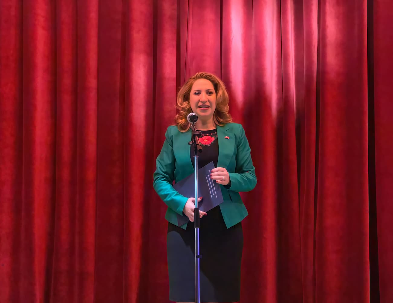 Photo 1: The principal giving a speech